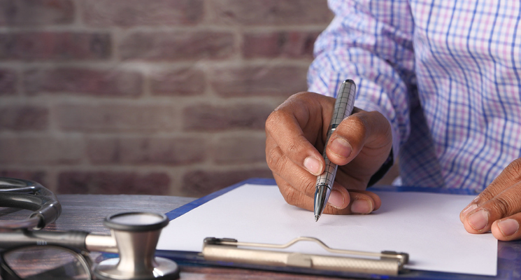 Close up man holding papers